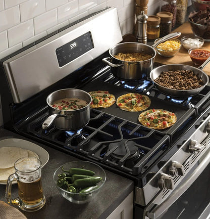 Casavibeo GE 30-inch freestanding gas range with four burners and oven, stainless steel finish, and control knobs on the front.
