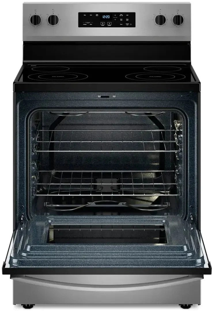 Whirlpool electric range by Casavibeo with four burners and digital control panel on a modern kitchen countertop.