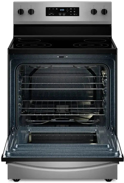 Whirlpool electric range by Casavibeo with four burners and digital control panel on a modern kitchen countertop.