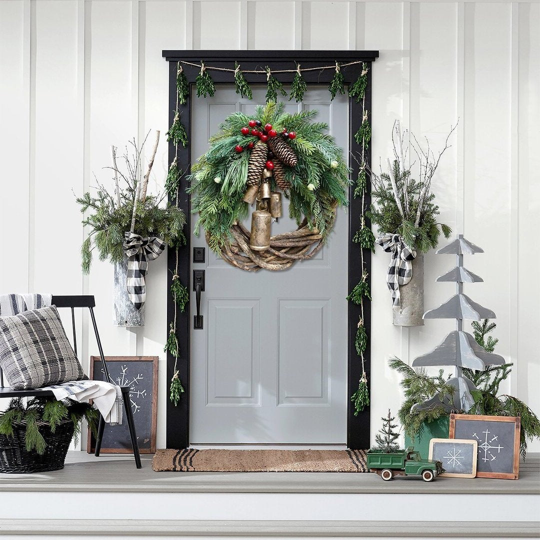 Farmhouse Christmas wreath with boho holiday decor, featuring natural greenery and decorative accents for home decoration.
