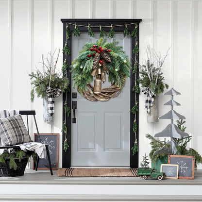 Farmhouse Christmas wreath with boho holiday decor, featuring natural greenery and decorative accents for home decoration.