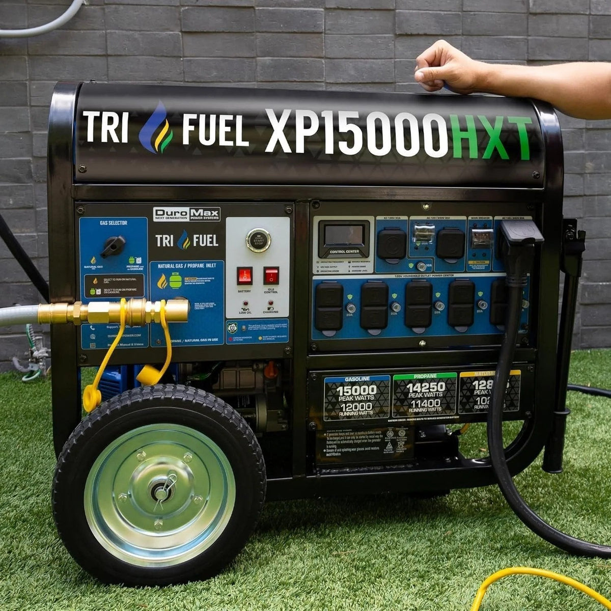 Casavibeo DuroMax 15,000-Watt Tri-Fuel Portable Generator XP15000HXT with multiple outlets and sturdy frame in a yard setting