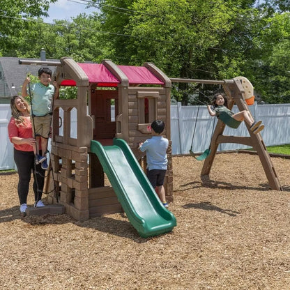 Casavibeo Step2 Naturally Playful Adventure Lodge play center with slides, climbing areas, and outdoor play features for kids.