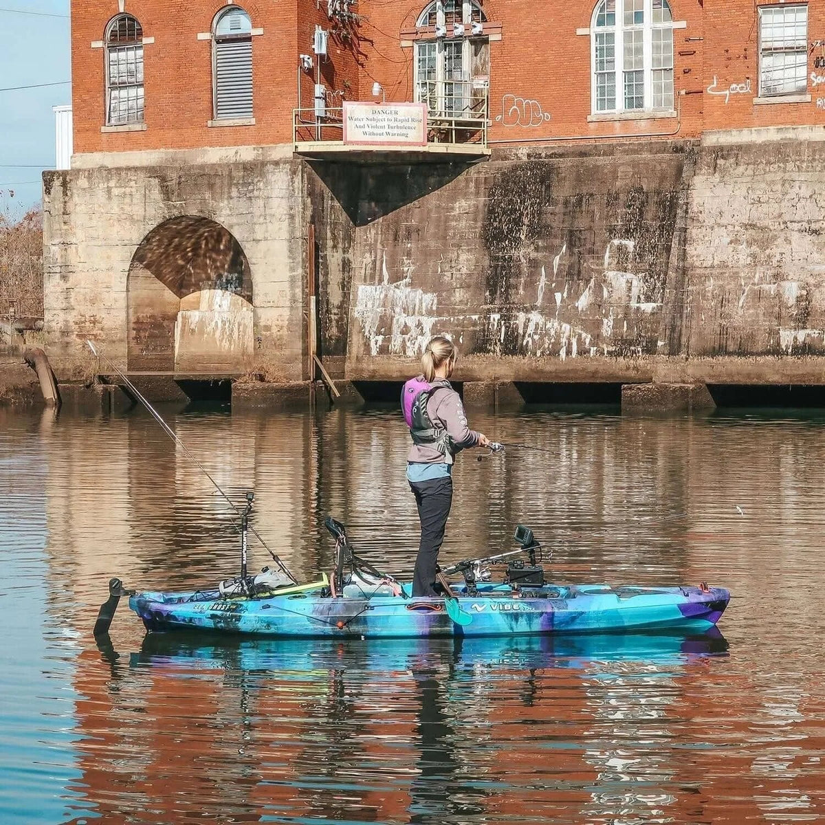 Casavibeo Vibe Kayaks Sea Ghost 110 kayak on water, featuring its sleek design and vibrant color for outdoor aquatic adventures.