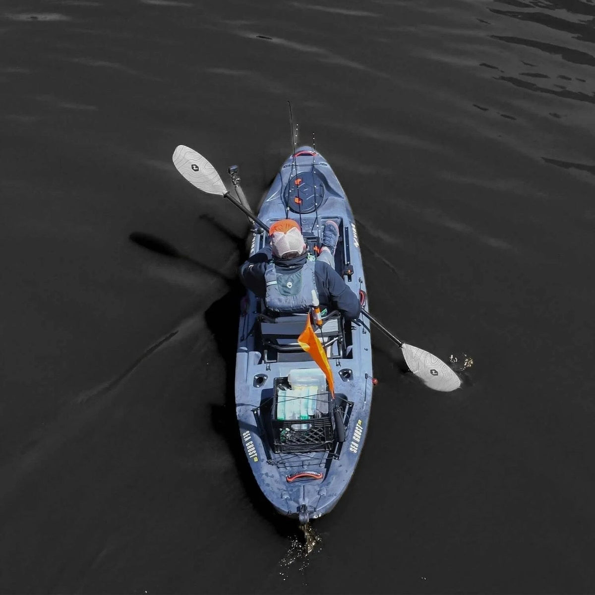 Casavibeo Vibe Kayaks Sea Ghost 110 kayak on water, featuring its sleek design and seating area for outdoor paddling adventures.