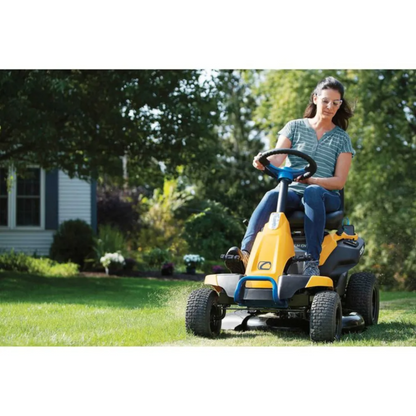 Casavibeo Cub Cadet CC30E riding lawn mower with 33-inch cutting deck and ergonomic seat, ready for yard maintenance.