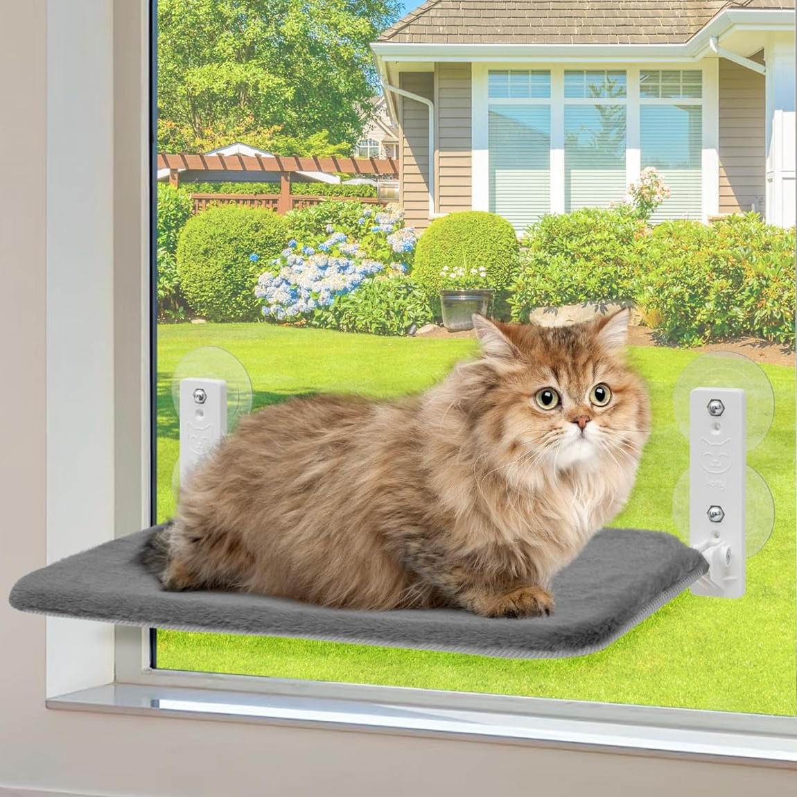 Belro cat hammock window perch mounted on a home window, providing a cozy resting spot for cats to enjoy the view.