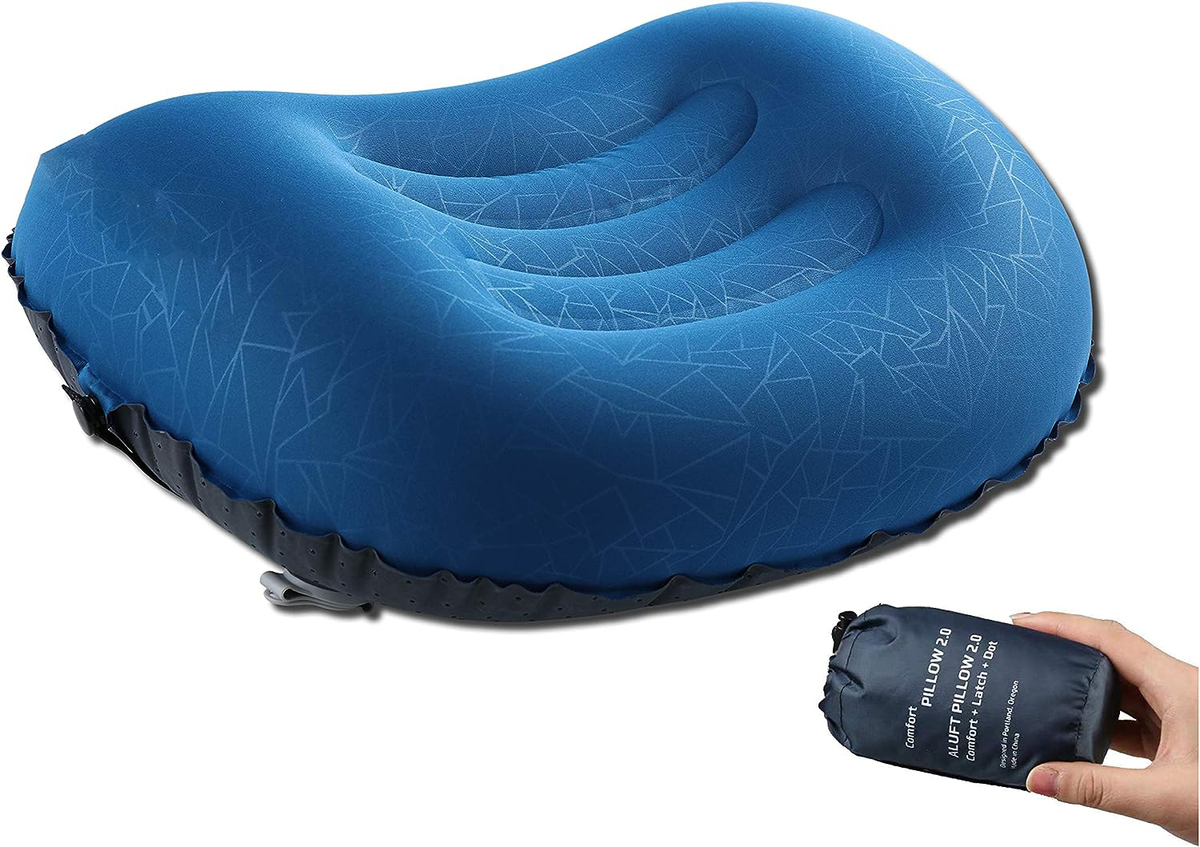 Belro backpacking and camping pillow, compact and lightweight, designed for outdoor sleep comfort during camping trips.