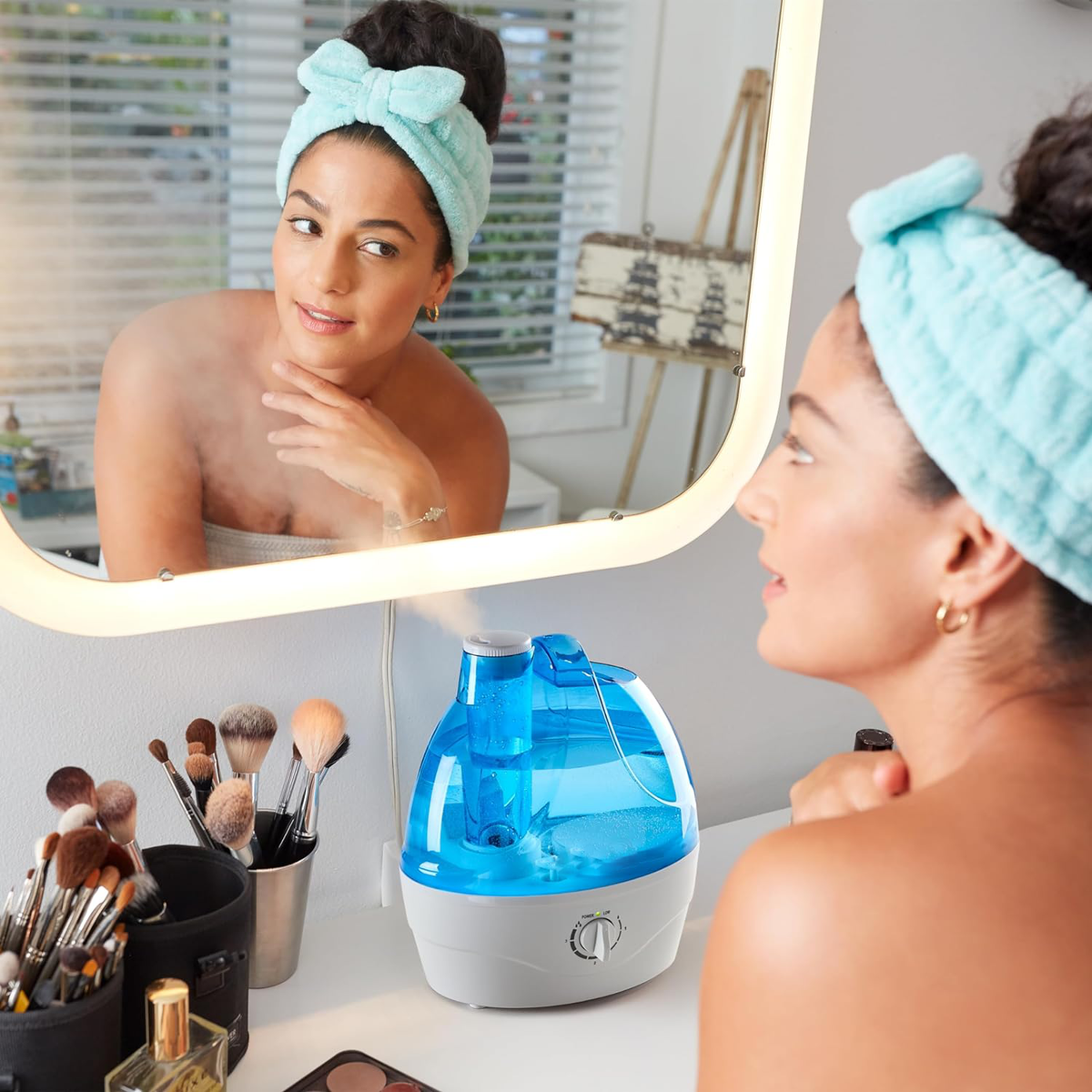 Belro Cool Mist Humidifier displaying a sleek white design with a water tank and mist outlet for home use.