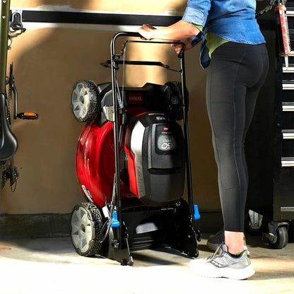 Toro 60V Recycler SmartStow 21-inch self-propelled mower with rear-wheel drive, featuring a compact design and grass collection bag.