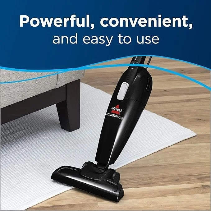 Casavibeo Bissell Featherweight stick vacuum in black with crevice tool, lightweight and bagless for easy cleaning