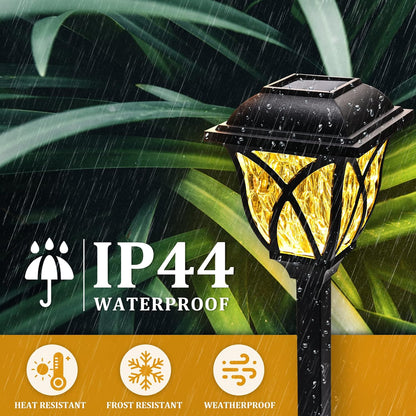 Six Belro solar LED pathway garden lights illuminating outdoor walkway with modern design in a garden setting.