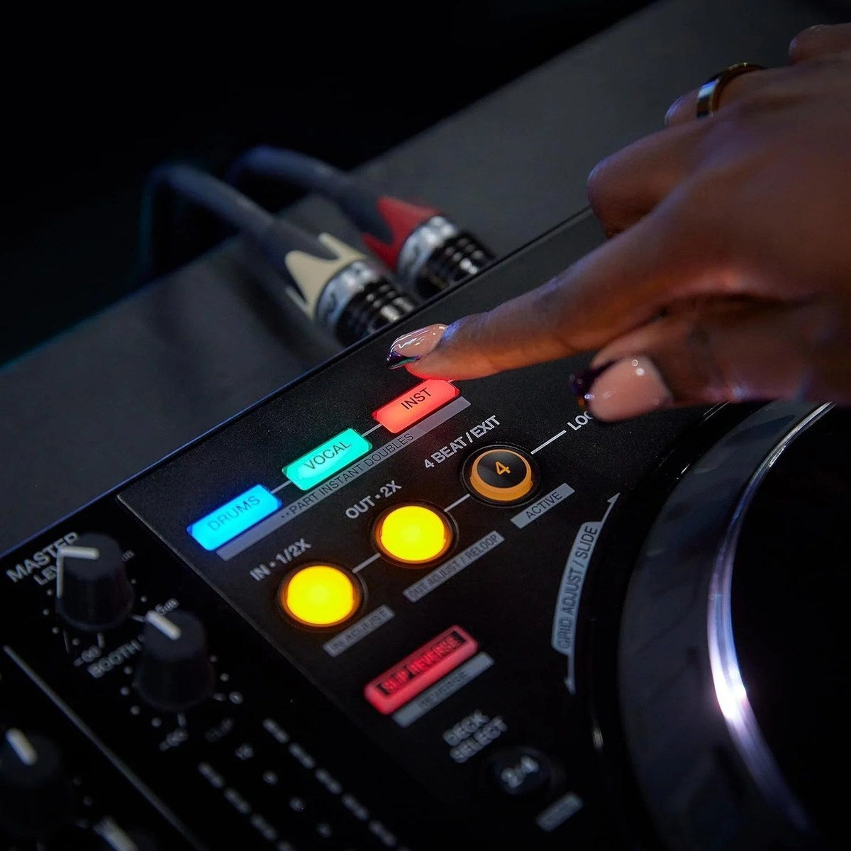 Pioneer DJ DDJ-FLX10 4-channel DJ controller with jog wheels, mixer, and control knobs, designed for professional DJ setups