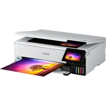 Epson EcoTank Photo ET-8550 all-in-one supertank printer with multiple paper trays and control panel, shown in a home office setting.