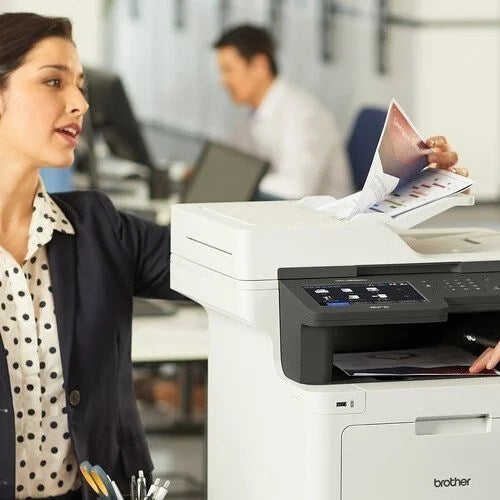 Wireless color laser printer from Brother MFC-L8905CDW with multiple paper trays and a large control panel.
