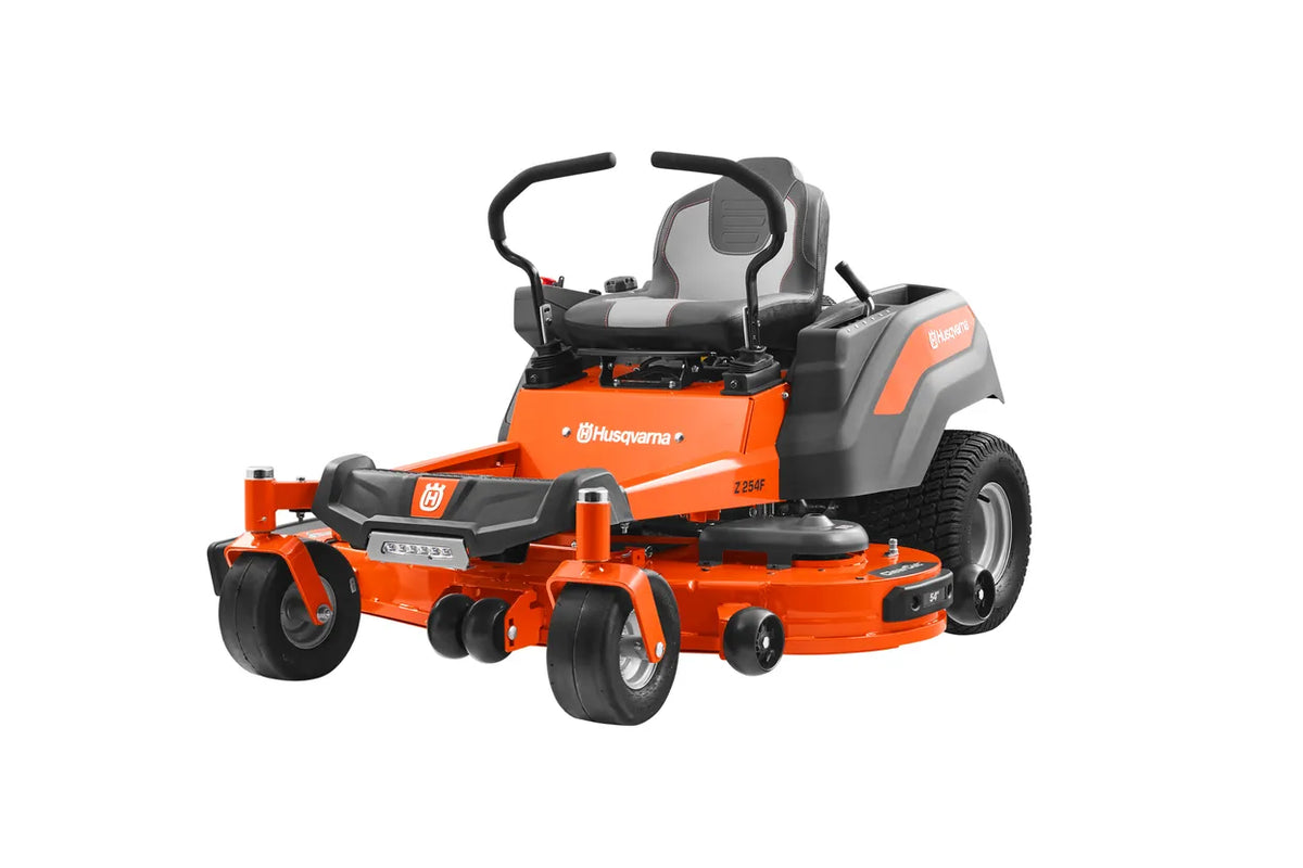 Husqvarna Z254F 54-inch zero-turn riding lawn mower with 24 HP Kawasaki engine, shown on a lush green lawn.