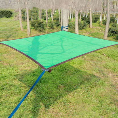 Belro outdoor mesh patio sun shade sail canopy attached to a patio, providing shade and UV protection for outdoor spaces.