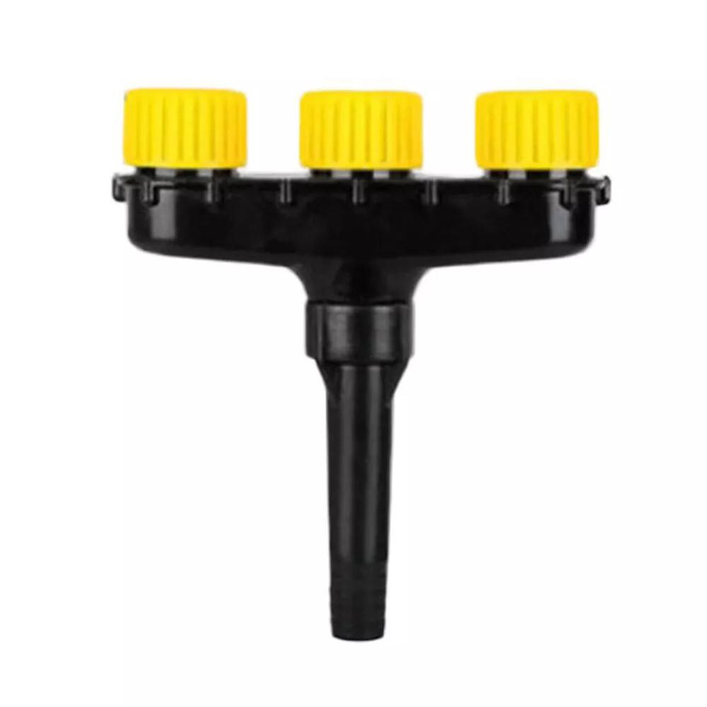 Belro multipurpose garden atomizer nozzle attachment connected to garden hose for watering and spraying plants outdoors.
