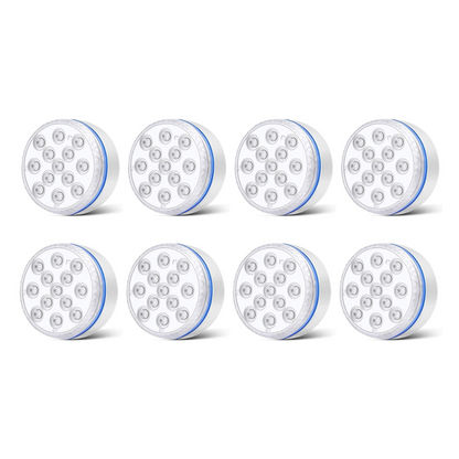 Colorful submersible LED pool party lights by Belro in vibrant hues floating in a pool during a nighttime gathering.