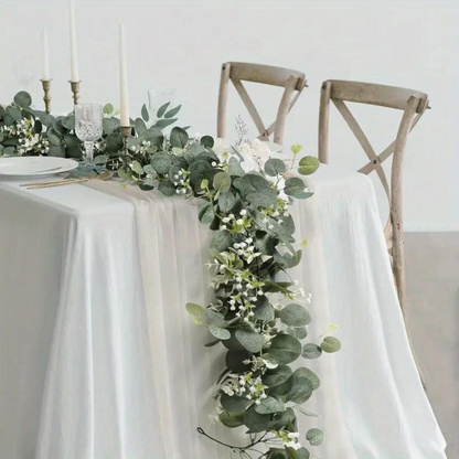 Faux eucalyptus garland by Belro, elegant decorative greenery for home and garden decor, with lush green leaves and natural appearance.