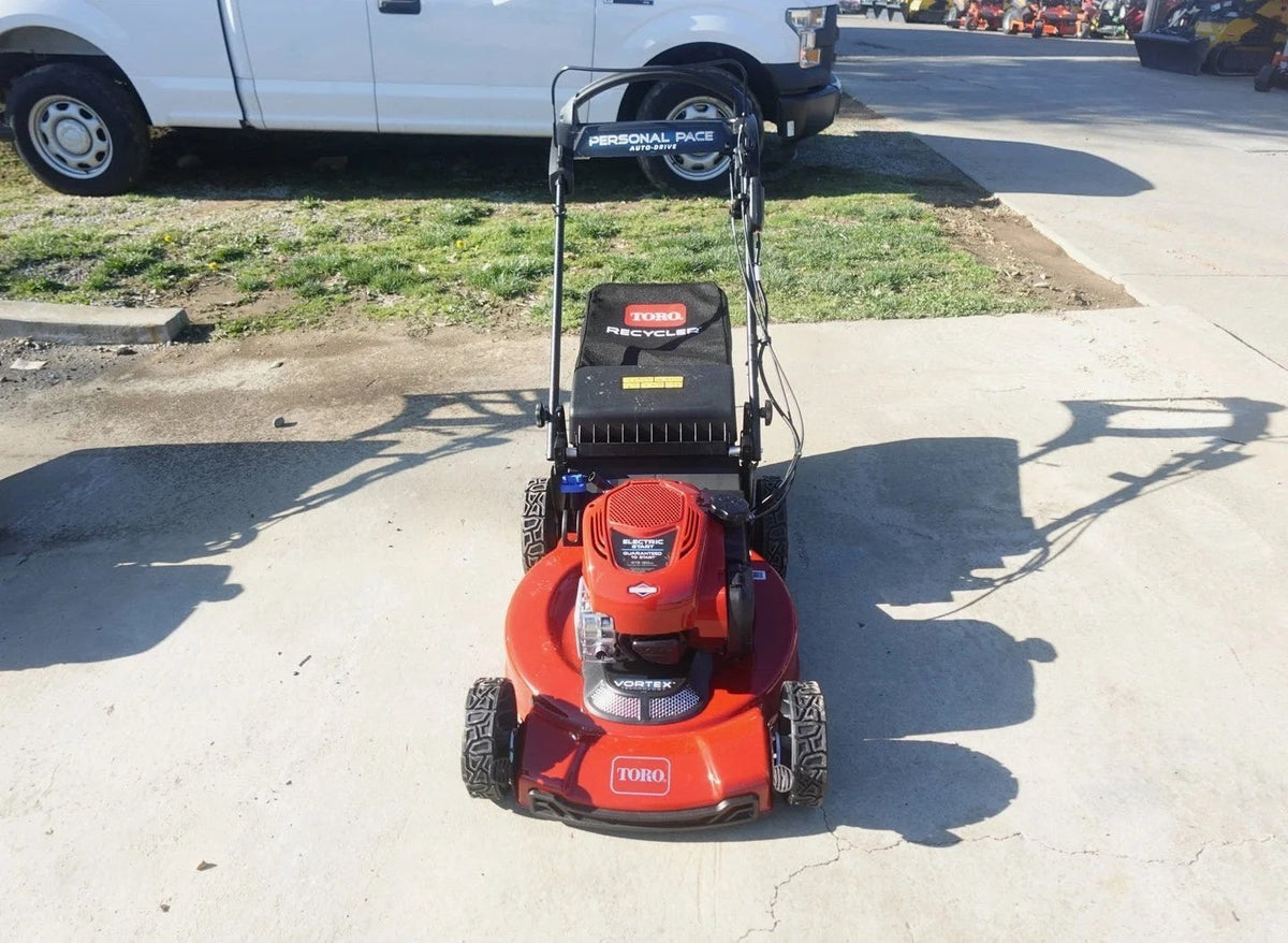 Casavibeo Toro 22-inch Recycler SmartStow electric lawn mower with grass collection bag and adjustable cutting height.