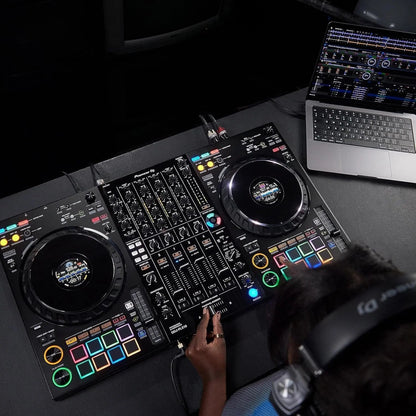 Casavibeo Pioneer DJ DDJ-FLX10 4-channel DJ controller with jog wheels, control knobs, and multiple input/output ports.