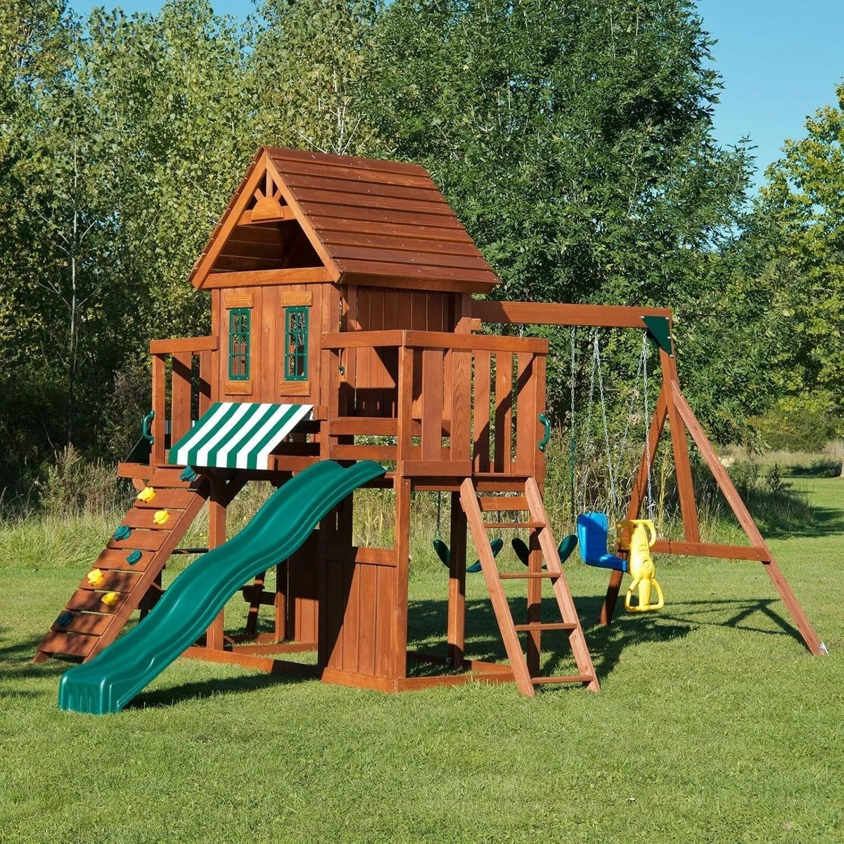 Casavibeo Swing-N-Slide Winchester complete play set with slides, swings, and climbing features for kids in a backyard playground.