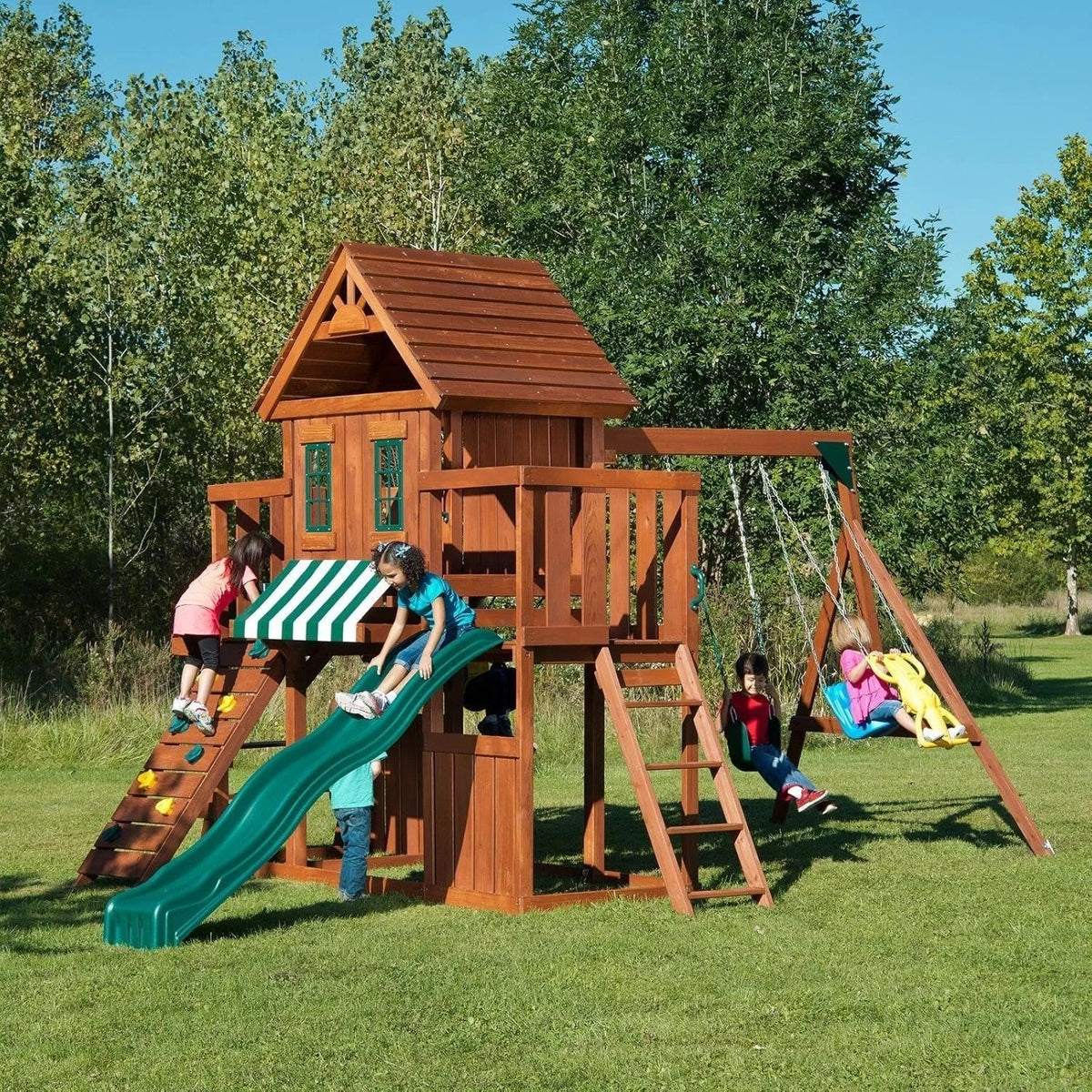 Casavibeo Swing-N-Slide Winchester complete play set with slide, swings, and climbing features in a backyard setting