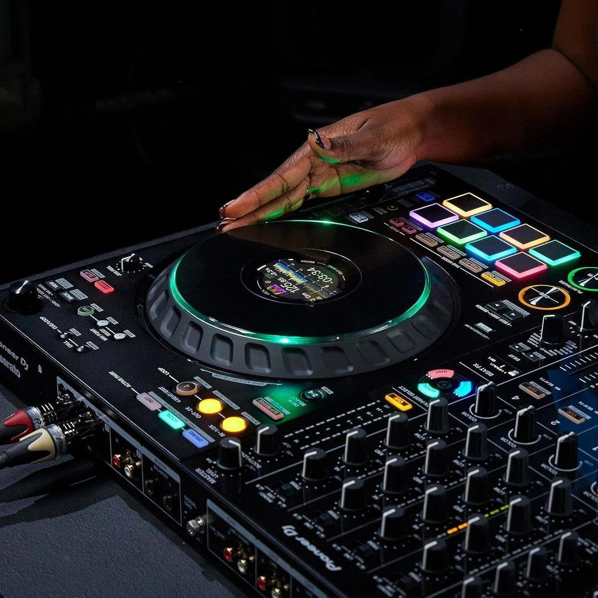 Casavibeo Pioneer DJ DDJ-FLX10 4-channel DJ controller with jog wheels, control knobs, and input ports for mixing music.