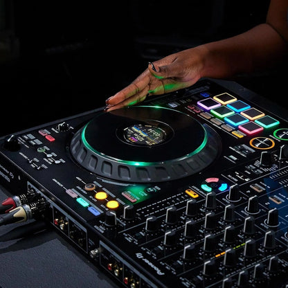 Casavibeo Pioneer DJ DDJ-FLX10 4-channel DJ controller with jog wheels, control knobs, and input ports for mixing music.