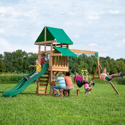 Casavibeo Backyard Discovery Belmont cedar swing set with slide, swings, and climbing ladder in a backyard setting