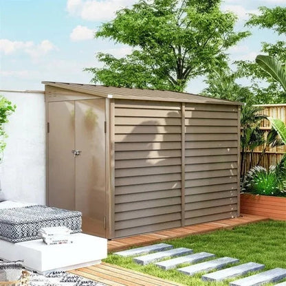 Casavibeo garden shed with white doors and window, set in a lush outdoor garden area.