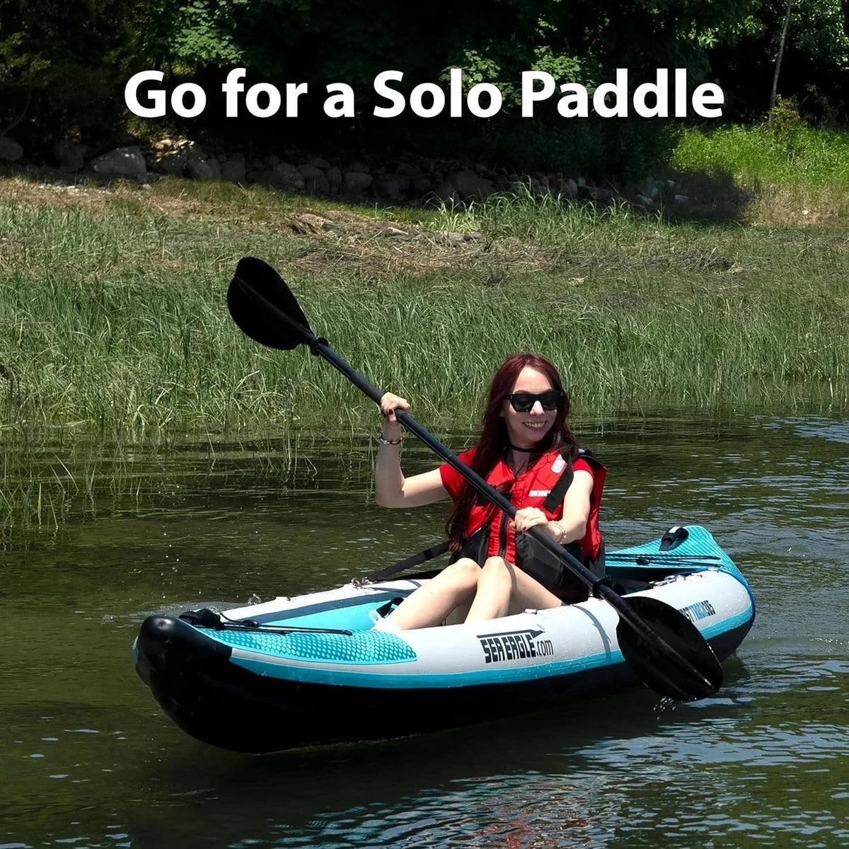 Casavibeo Sea Eagle 385ft FastTrack V-bottom inflatable kayak shown on water, featuring durable construction and V-shaped hull for stability.