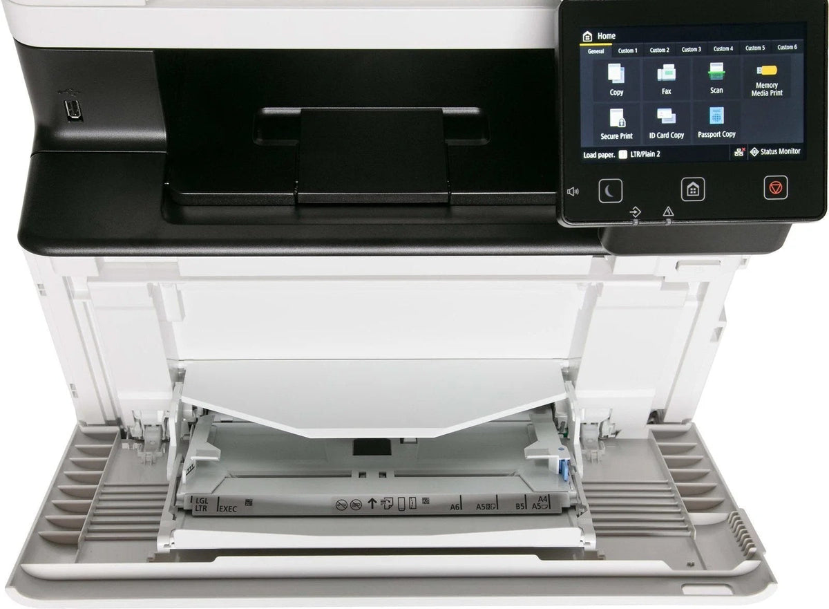 Canon imageCLASS MF753Cdw wireless color laser printer with control panel and paper tray in a professional office setting