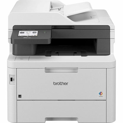 Brother MFC-L3780CDW wireless laser color printer with multiple paper trays and digital display, in a home office setting.
