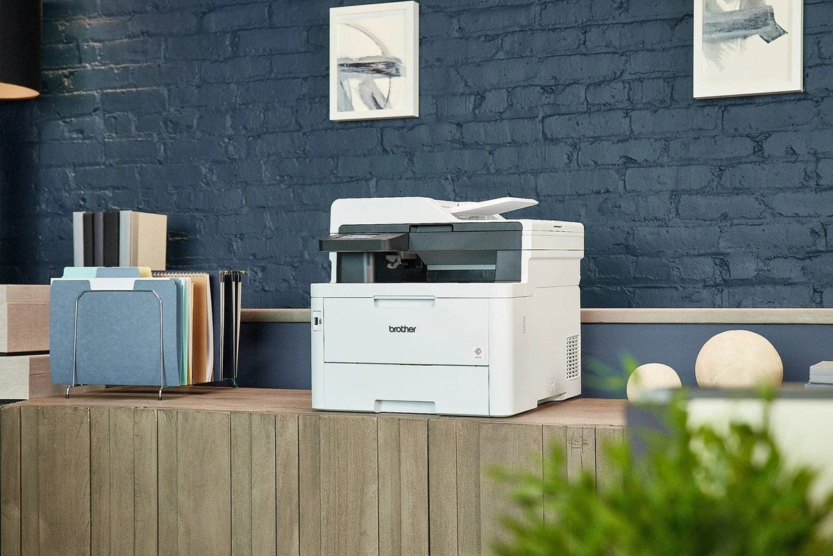 Brother MFC-L3780CDW wireless laser color printer in black with control panel and paper tray, ideal for home or office use.