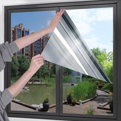 Belro reflective one-way privacy glass window insulation film showing transparent surface with reflective backing for privacy and insulation.
