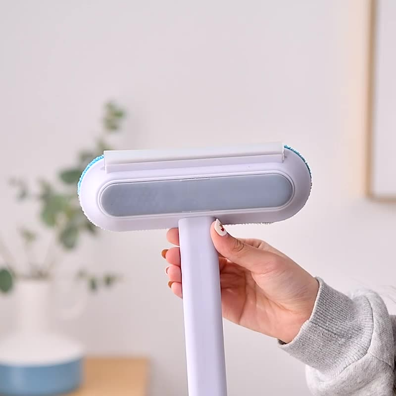 Belro 4-in-1 pet hair remover tool for dogs, featuring multiple grooming surfaces to easily remove loose fur from pet coats.