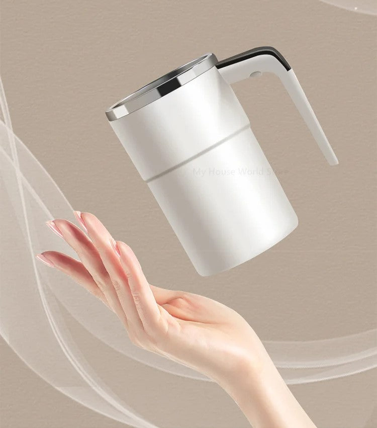 Belro rechargeable mug with built-in stirring mechanism, black ceramic with digital control display, on a wooden table.