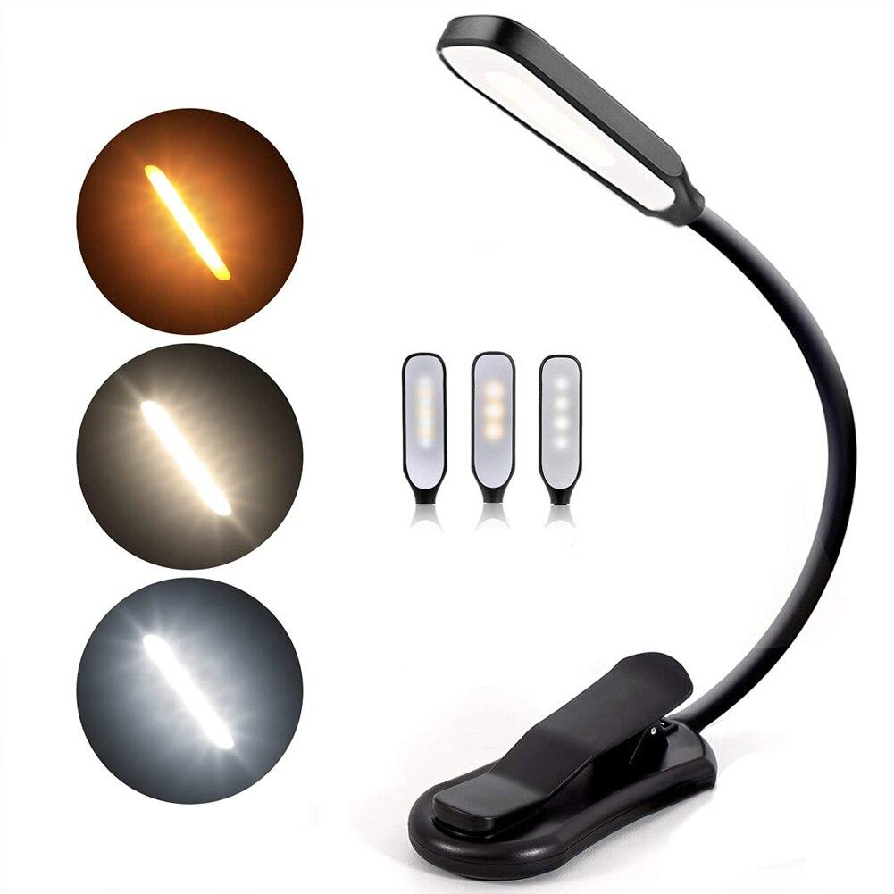 Belro reading lamp clamp for outdoor use, attached to a book, providing focused lighting for reading in the outdoor home and garden setting.