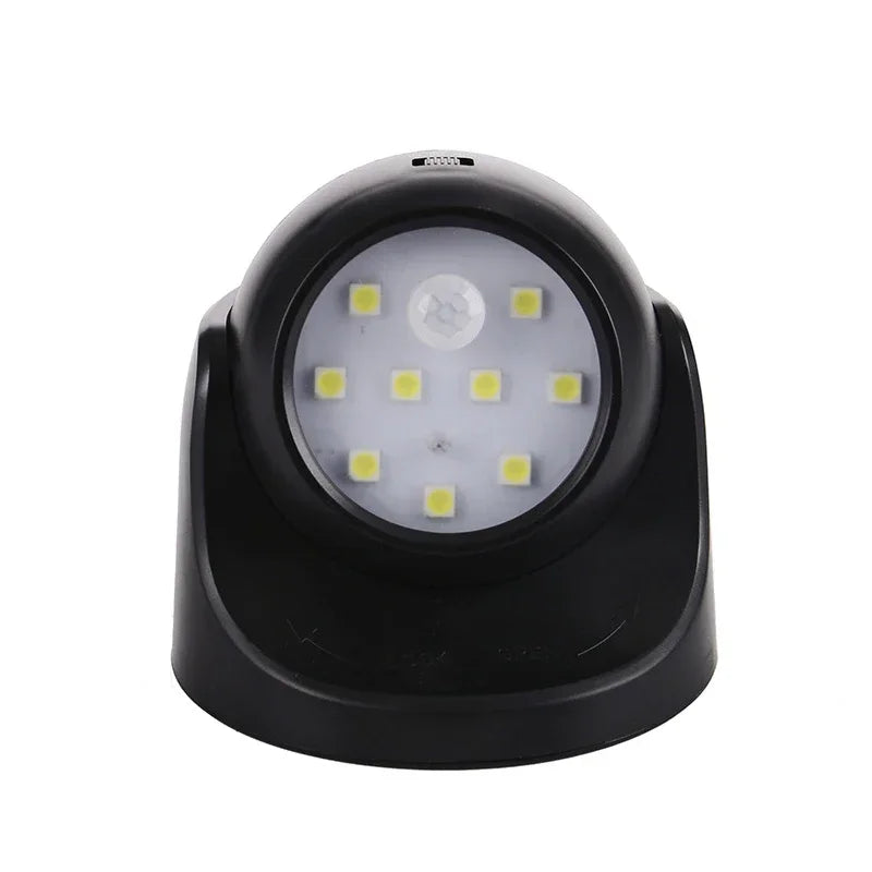 Wireless LED spotlight with motion detector by Belro, 360° rotatable outdoor light for home and garden security.