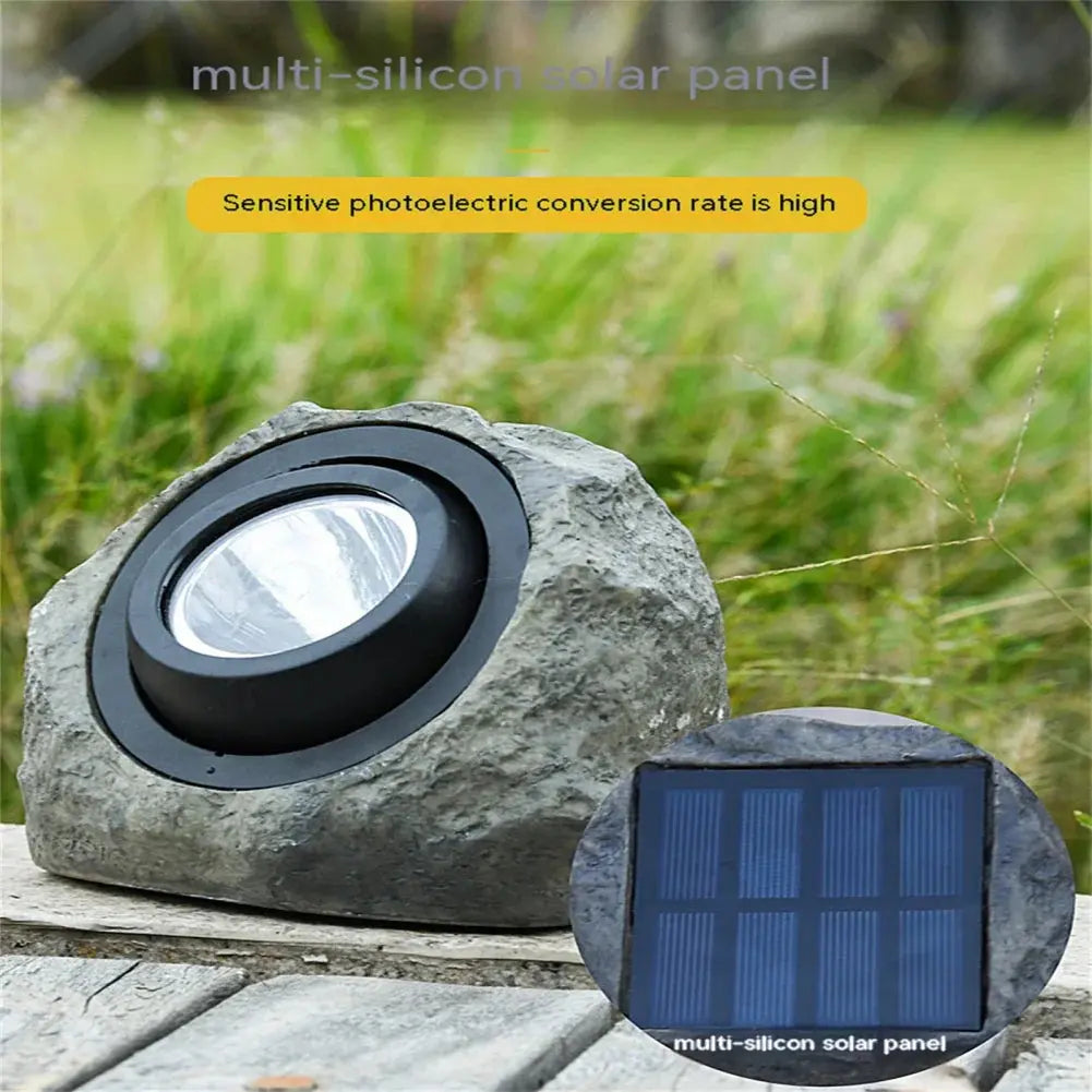 Belro Stonelight pathway outdoor lighting in garden, showcasing a stone-style pathway light illuminating a garden path.