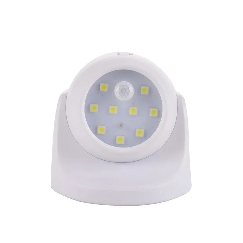Wireless LED spotlight with motion detector from Belro, 360° rotatable outdoor light for home and garden.