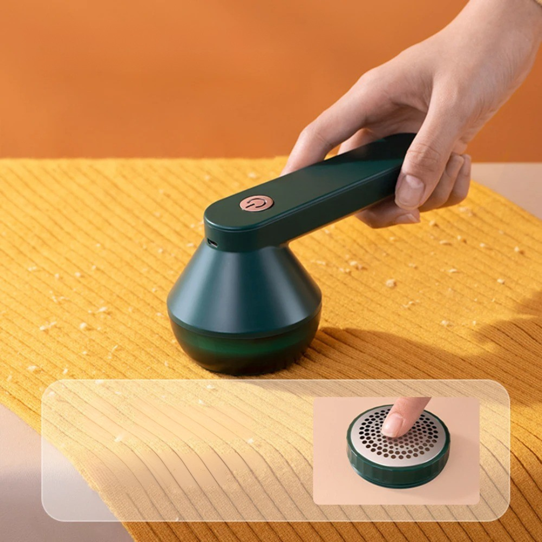 Belro electric lint remover for home and outdoor use, showing the handheld device with a cleaning head and power button.