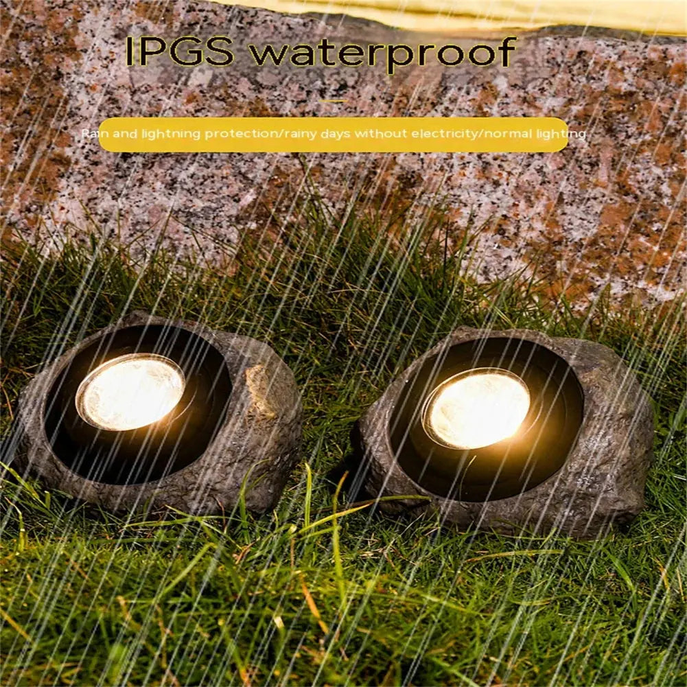 Belro Stonelight pathway lighting in outdoor garden setting, showcasing durable stone design for garden illumination.