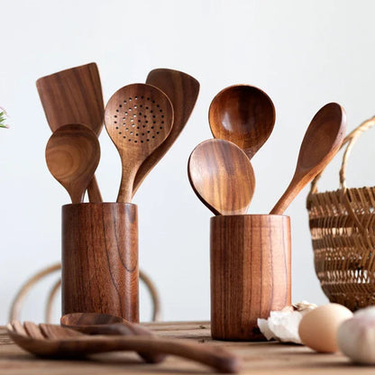 Natural teak wood kitchen set from Belro, including utensils and accessories for dining and cooking in a home kitchen.