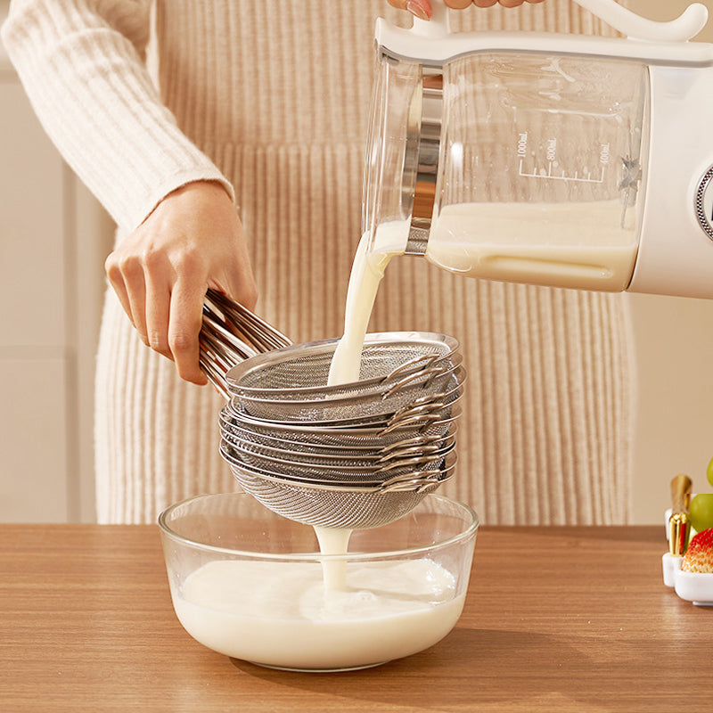 Belro multifunctional soy milk maker on kitchen countertop, showing digital control panel and stainless steel blending chamber.