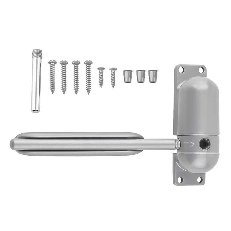 Belro automatic door closing mechanism installed on a door, showcasing tools and hardware for smooth, automated door operation.
