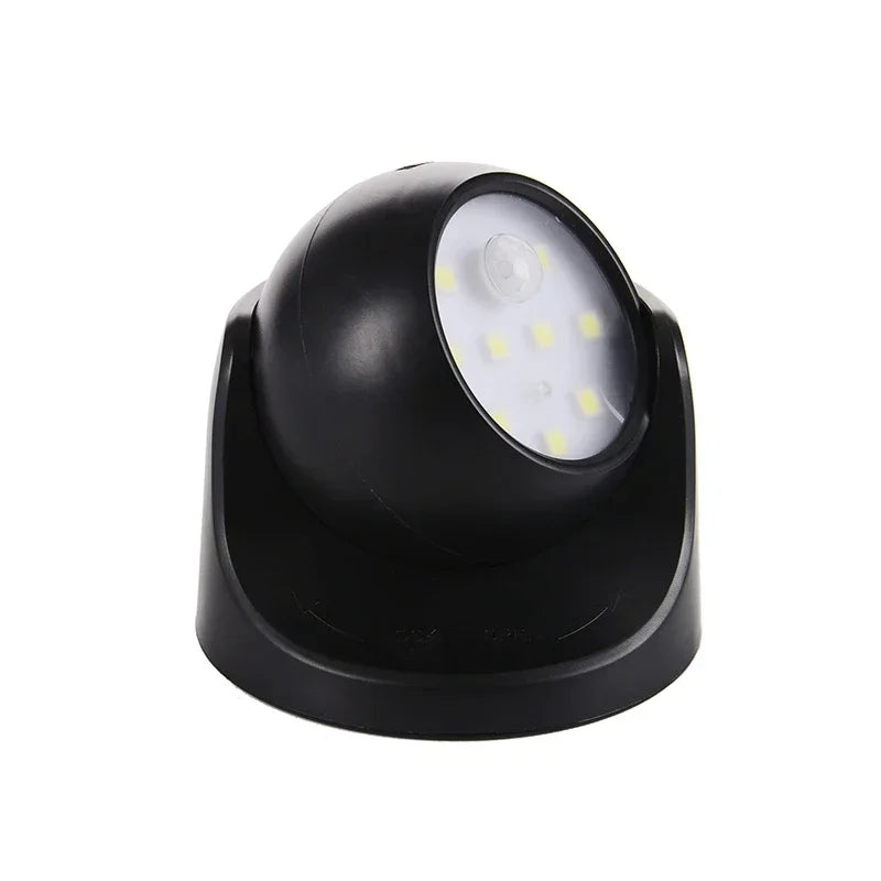 Wireless LED spotlight with motion detector from Belro, 360° rotatable outdoor light for home and garden security.