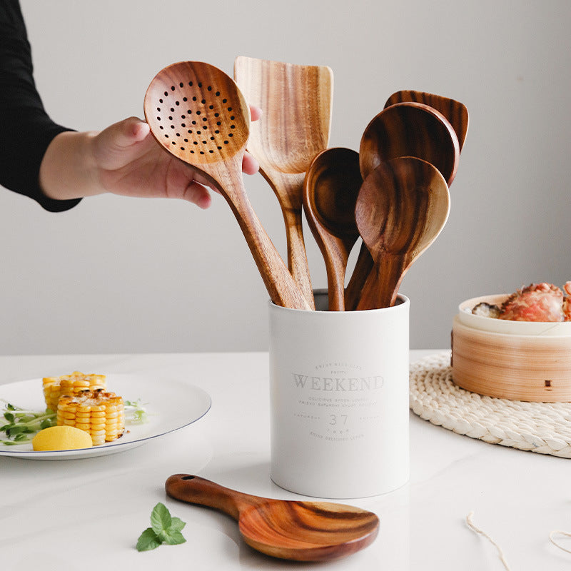 Natural teak wood kitchen set with utensils and accessories, ideal for home and dining environments, by Belro.